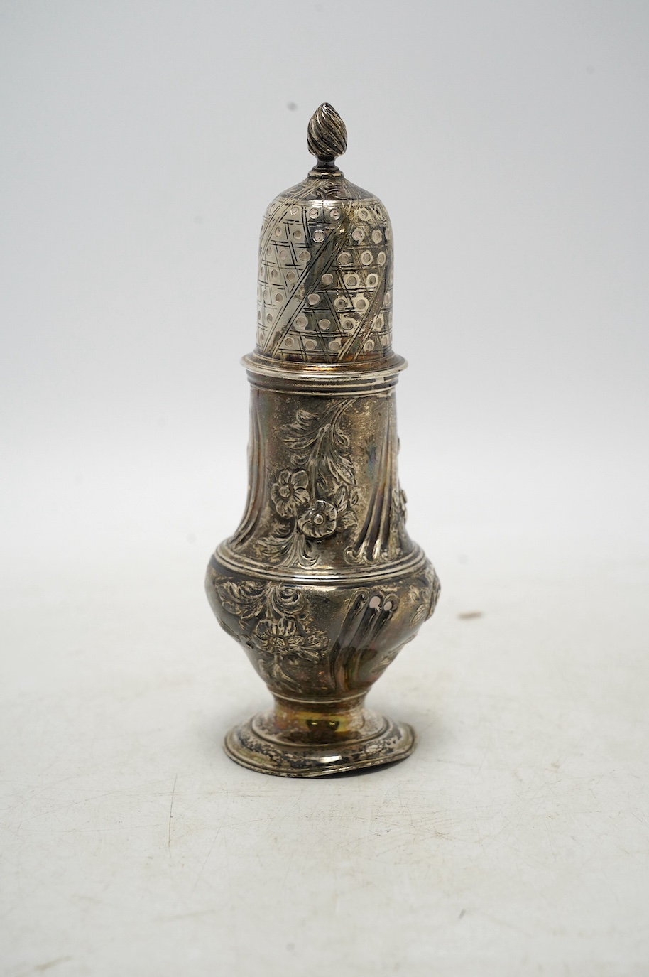 A George III silver baluster sugar castor, Robert Peaston, London, 1770, 16cm, 5.6oz. Condition - poor